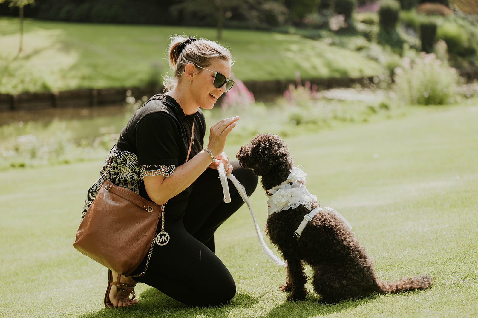 Lizzie, founder of Here Comes The Hound, with dogs